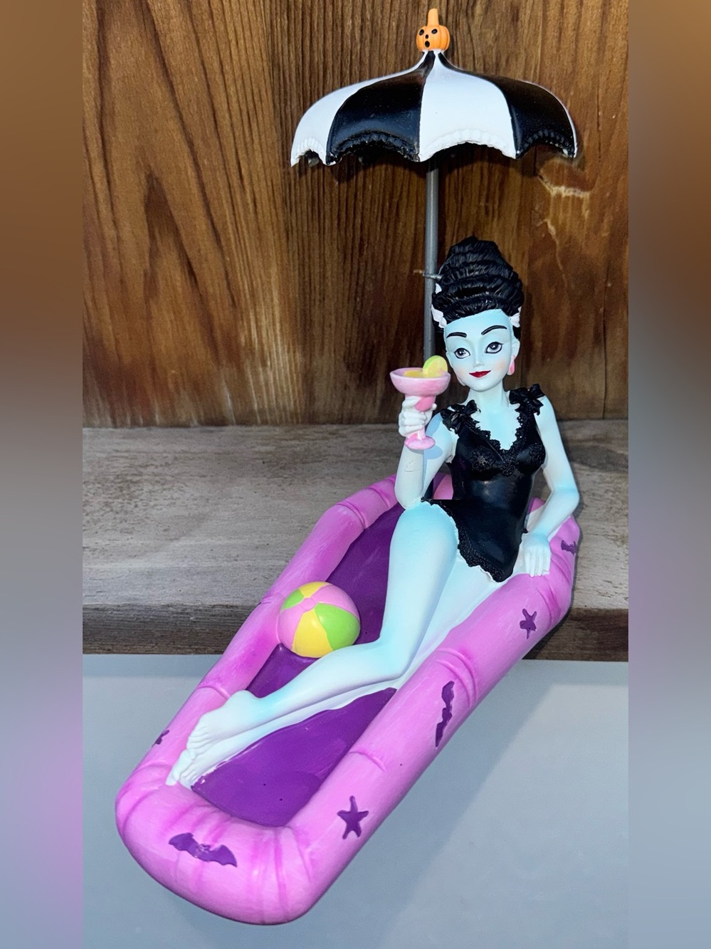 Cute 🥰 Bride Of Frankenstein having a Cocktail 🍸 On A Pink Float Halloween